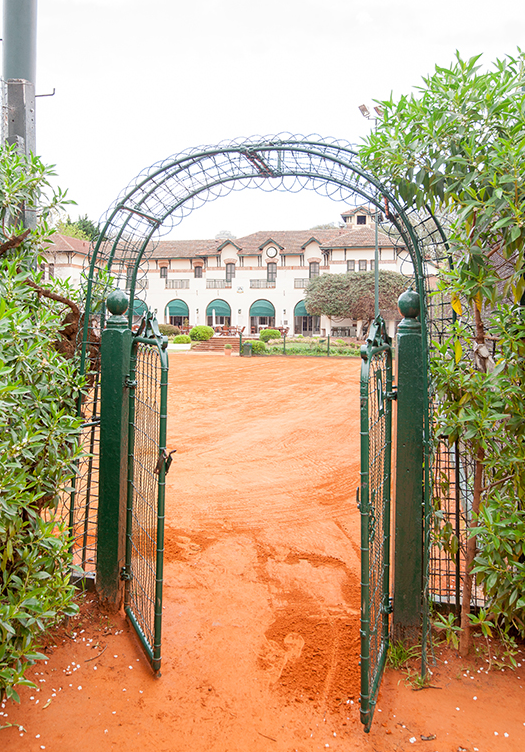 Entrance to a red clay court at the Buenos Aires Lawn Tennis Club